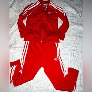 Kids adidas track suit size 5/6 red